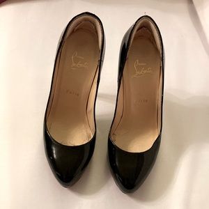 Christian Louboutin  black heels .